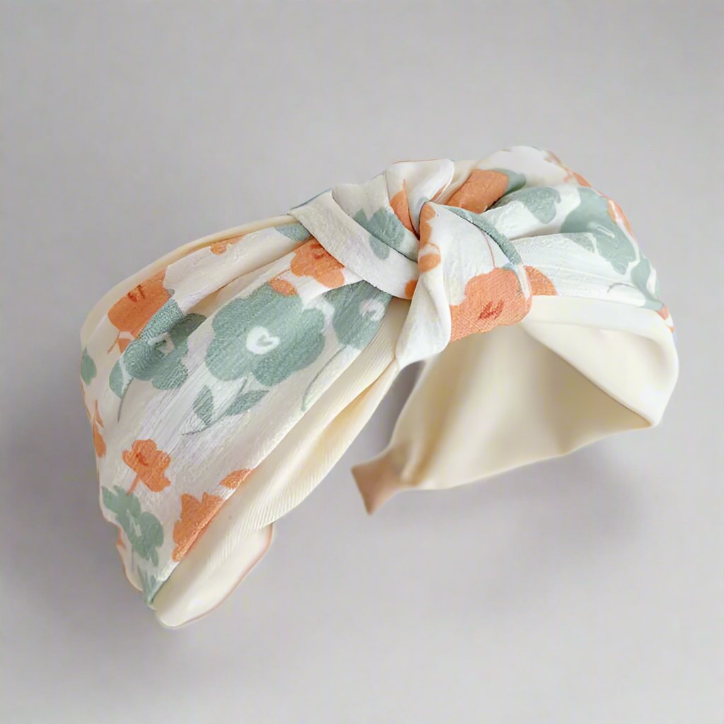 beige headband with light orange and grey flowers, 2 toned headband