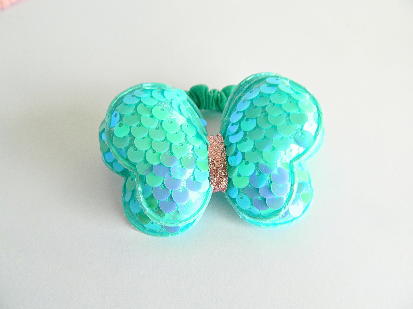 Coral butterfly hair tie