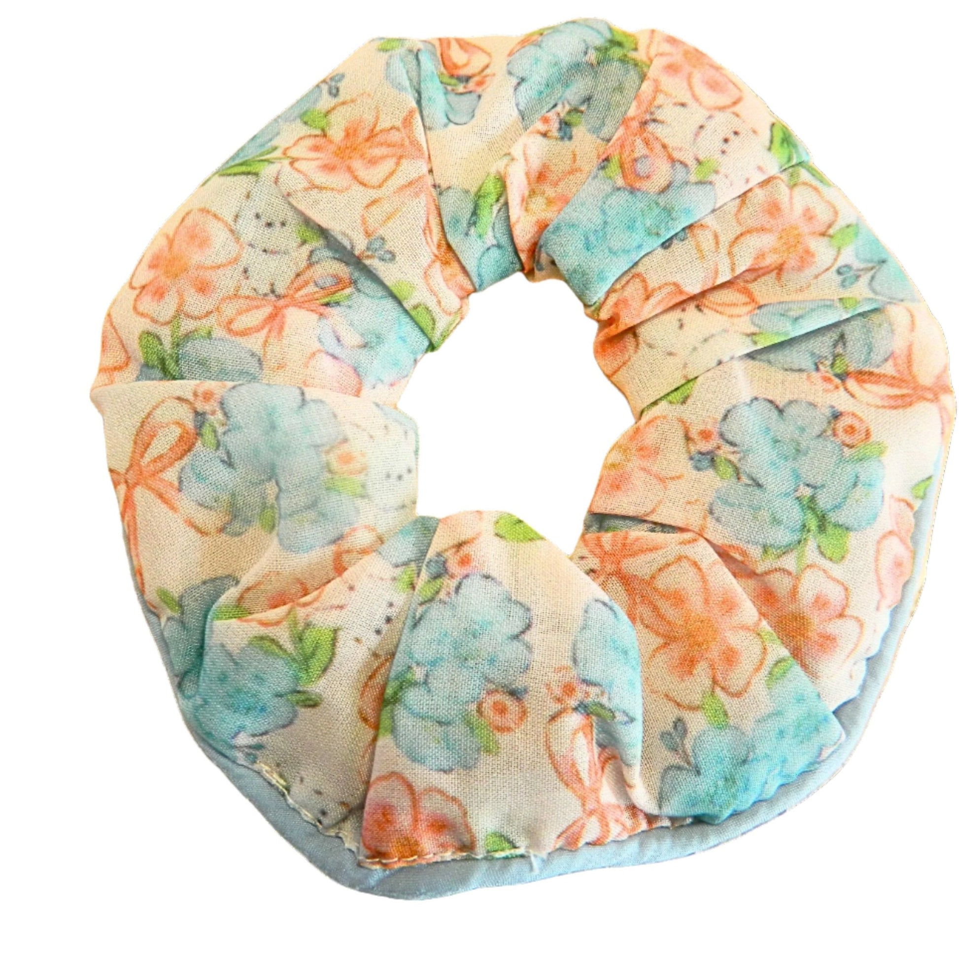 light blue and light orange scrunchie with flowers and bows