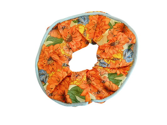 bright orange and red flowers scrunchie