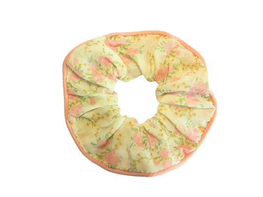 cream color scrunchie with light pink flowers