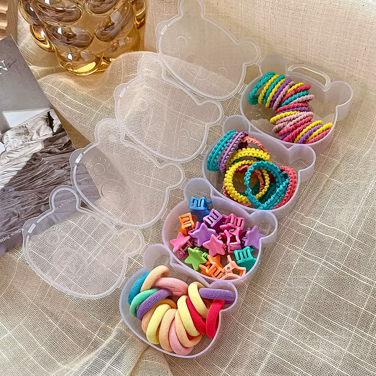 set of kids elastic bands and clips, multicolor, in a bear shaped box