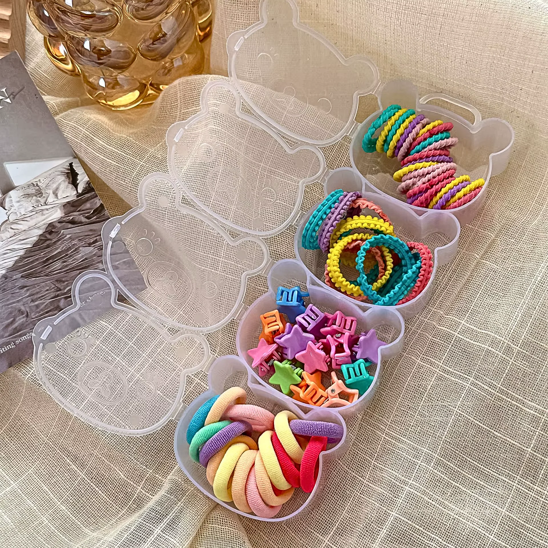 set of kids elastic bands and clips, multicolor, in a bear shaped box